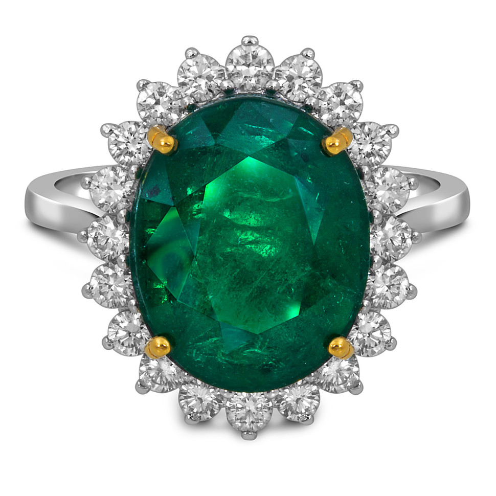 Кольцо из белого золота с бриллиантами и изумрудом (055081)