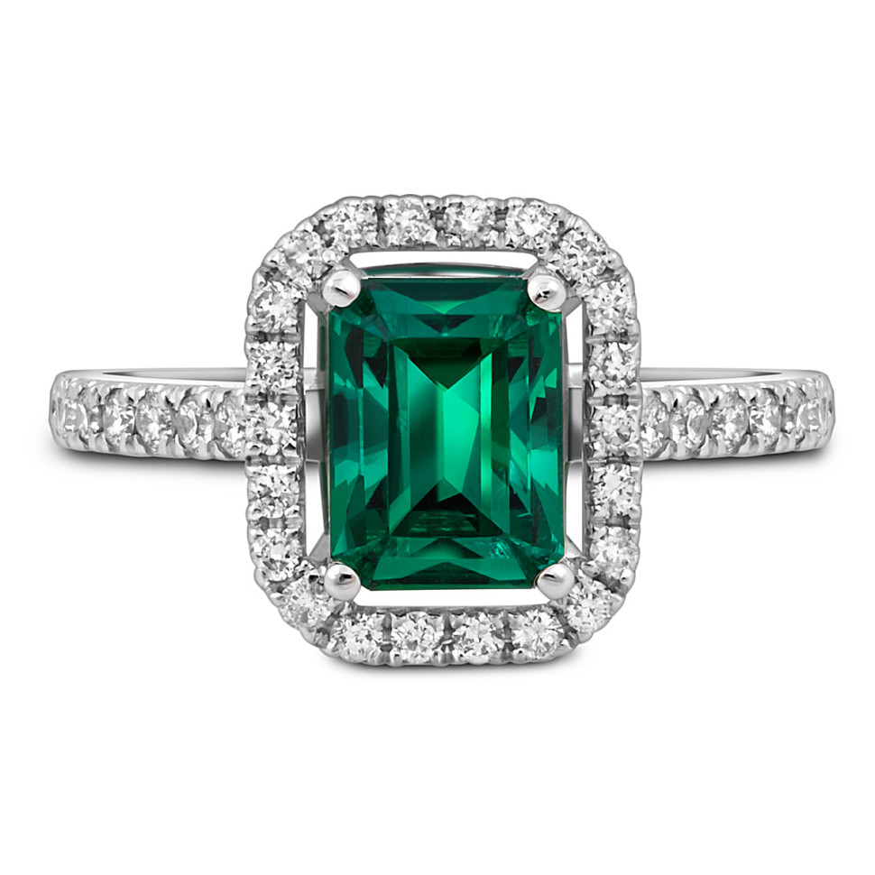 Кольцо из белого золота с бриллиантами и изумрудом (049396)