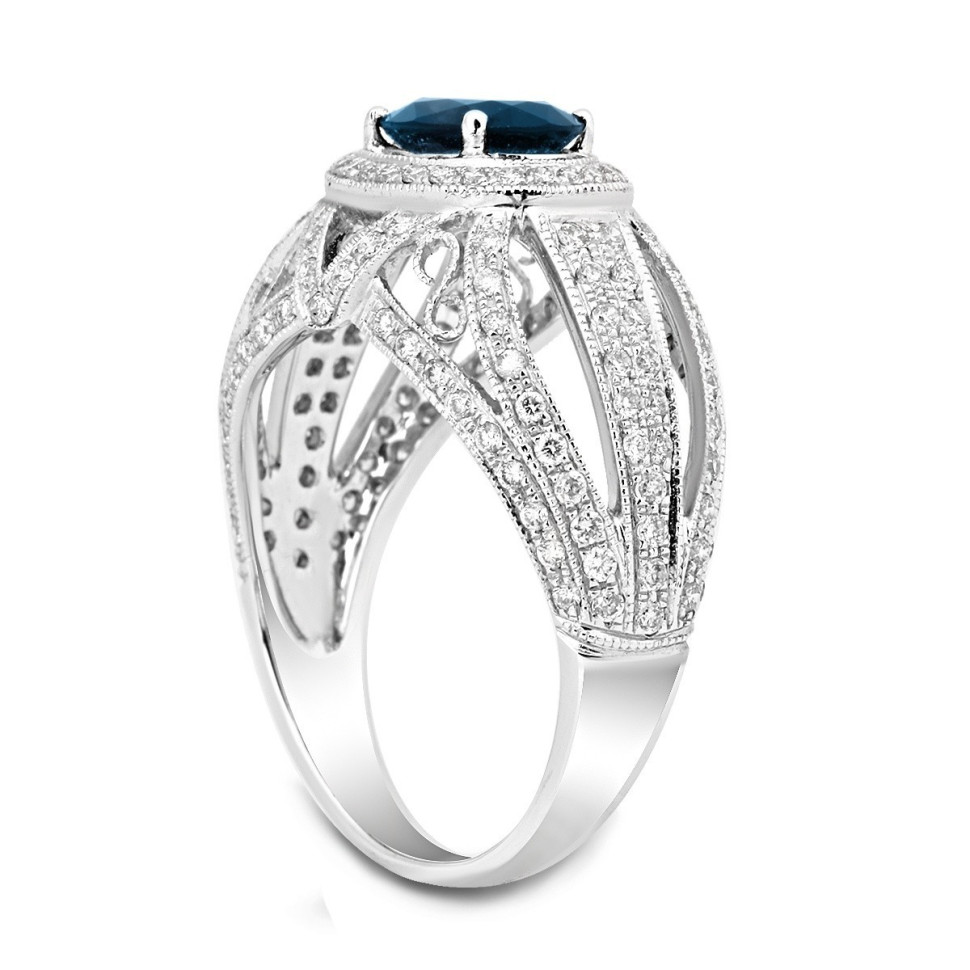 Кольцо из белого золота с бриллиантами и сапфиром (025563)