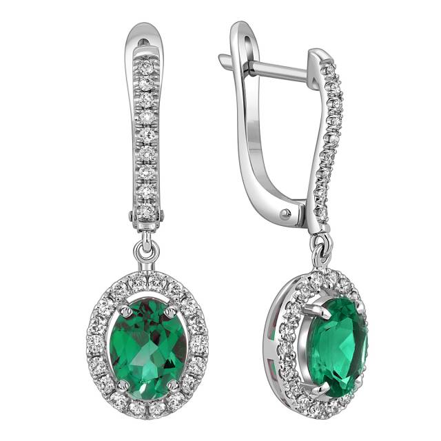 Серьги из белого золота с бриллиантами и изумрудами (060139)