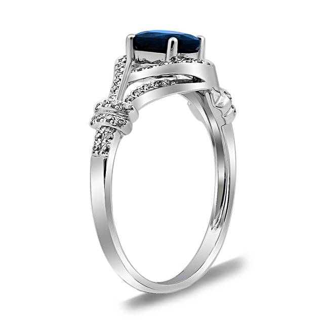 Кольцо из белого золота с бриллиантами и сапфиром (025303)