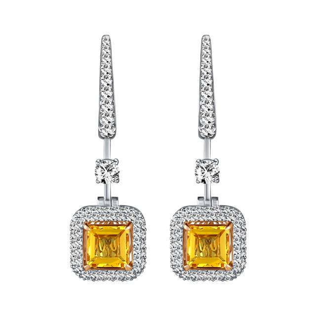 Серьги из белого золота с жёлтыми сапфирами и бриллиантами (064159)