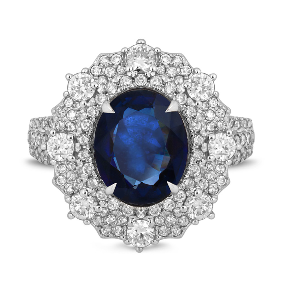 Кольцо из белого золота с бриллиантами и сапфиром (043989)