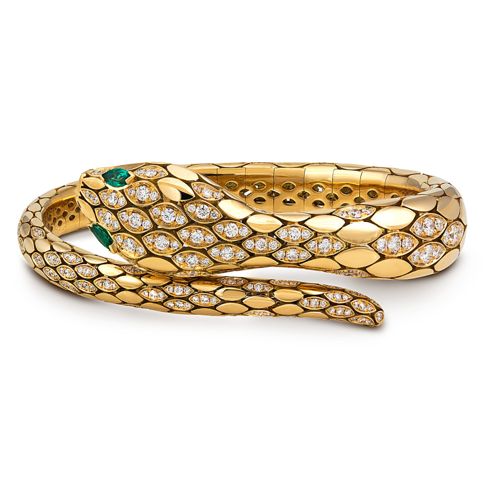 Браслет из белого золота с бриллиантами и изумрудами 