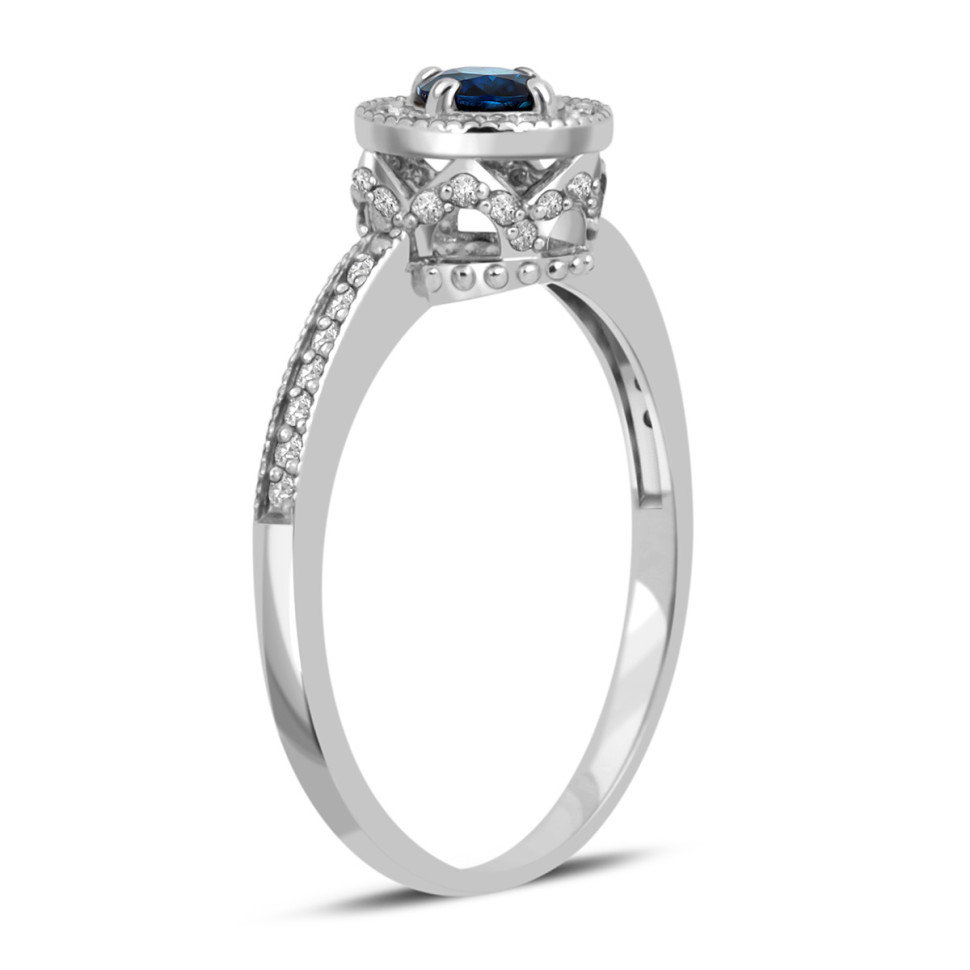 Кольцо из белого золота с бриллиантами и сапфиром (028529)