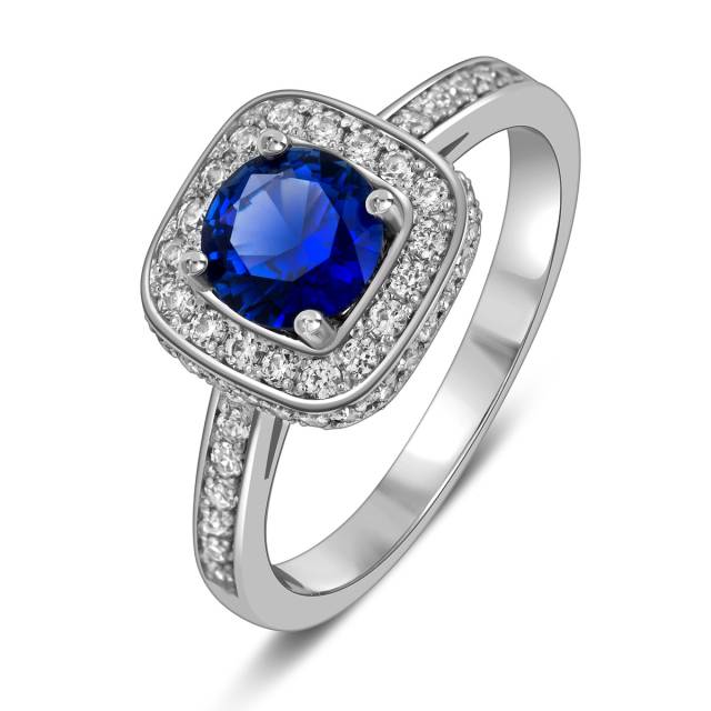 Кольцо из белого золота с синтетическим сапфиром и фианитами (023101)