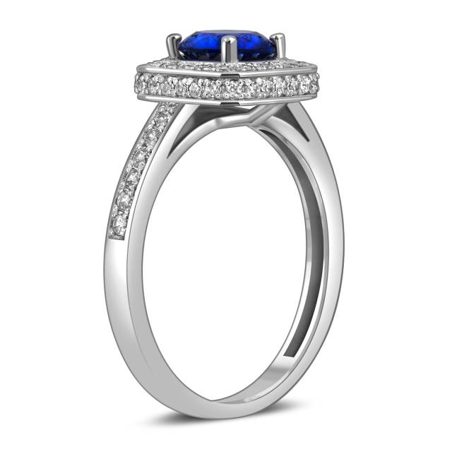 Кольцо из белого золота с синтетическим сапфиром и фианитами (023101)