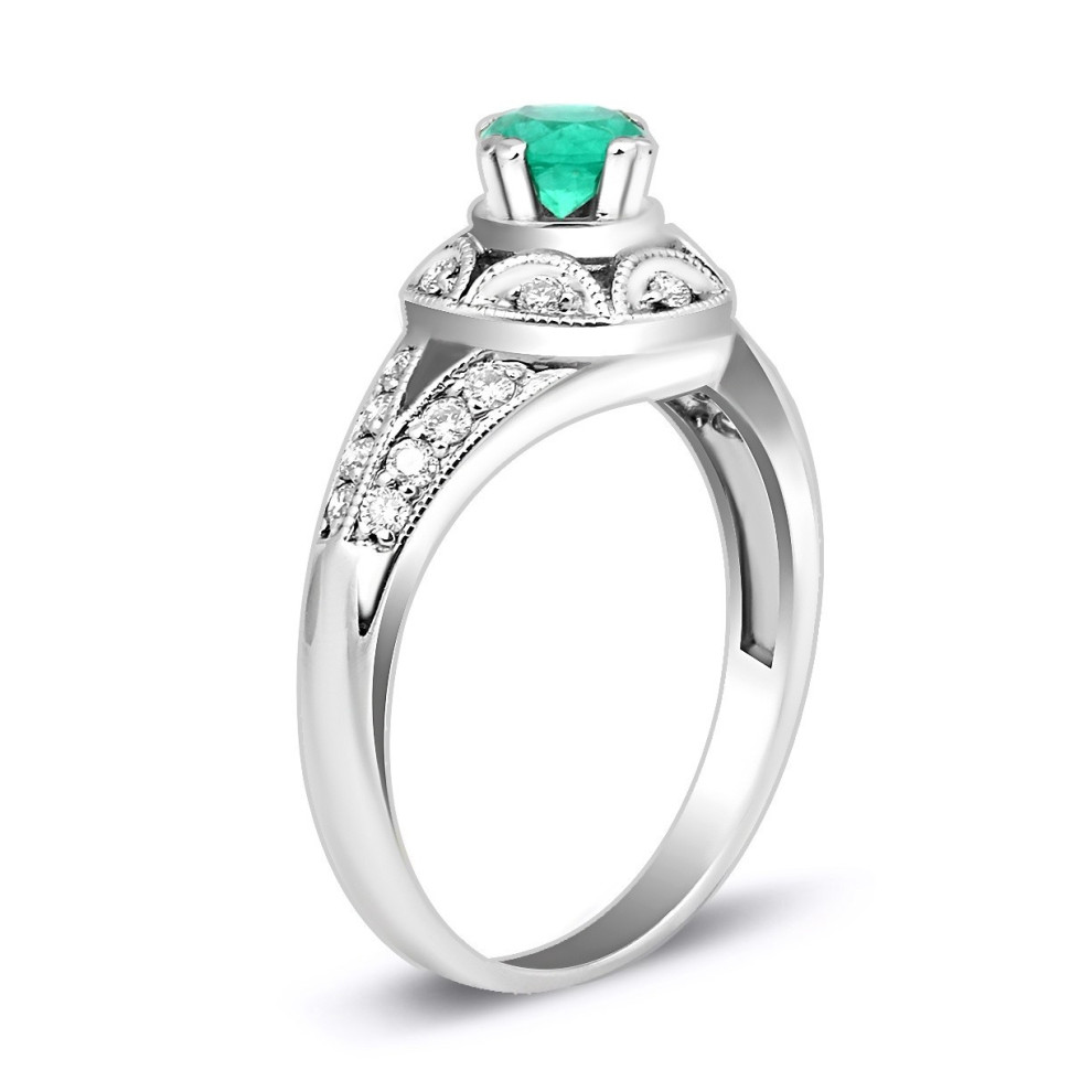 Кольцо из белого золота с бриллиантами и изумрудом (007264)