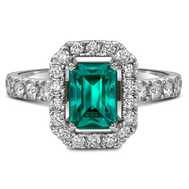 Кольцо из белого золота с бриллиантами и изумрудом (058711)