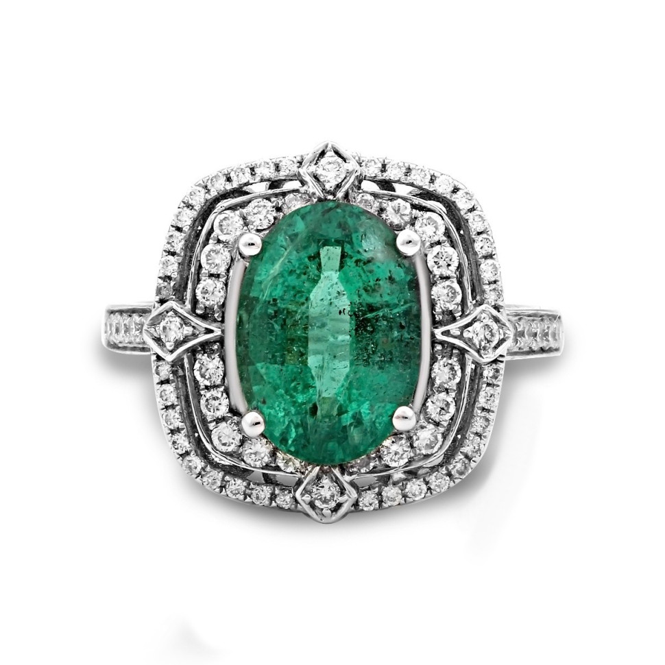 Кольцо из белого золота с бриллиантами и изумрудом (010666)