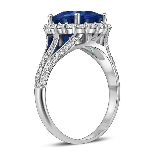 Кольцо из белого золота с бриллиантами и сапфиром (063880)