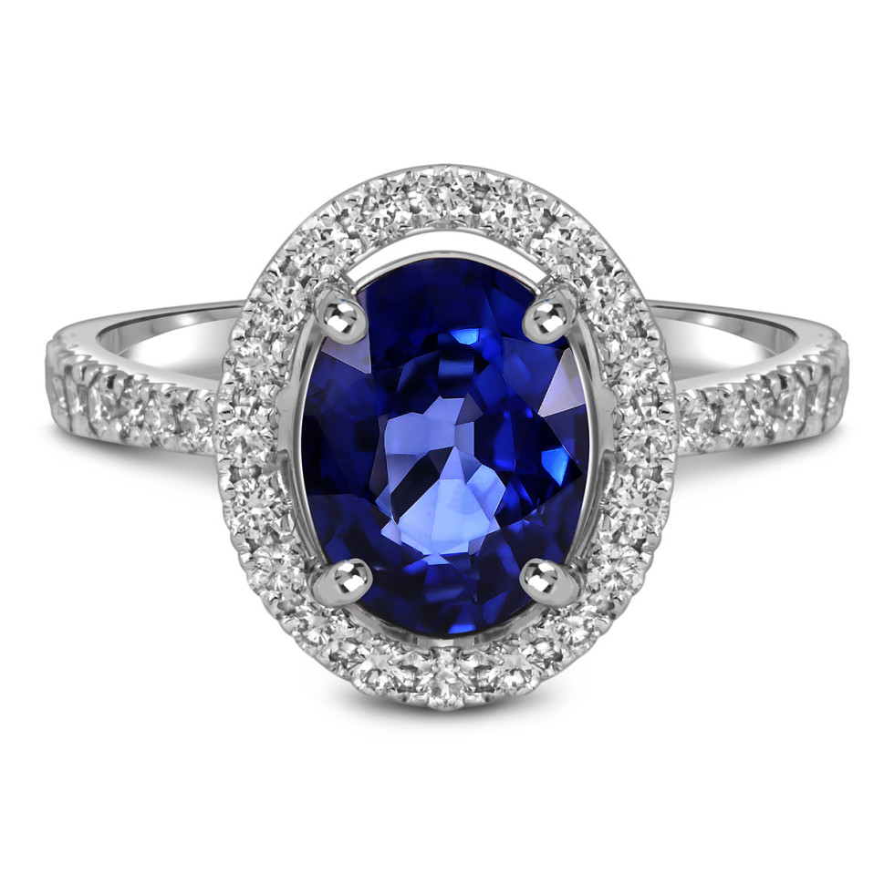 Кольцо из белого золота с бриллиантами и сапфиром (055606)