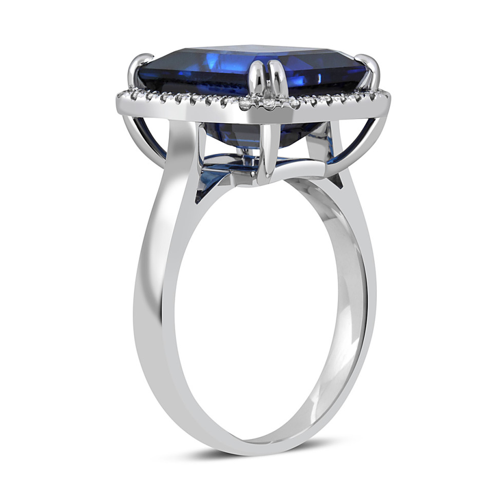 Кольцо из белого золота с бриллиантами и сапфиром (047981)